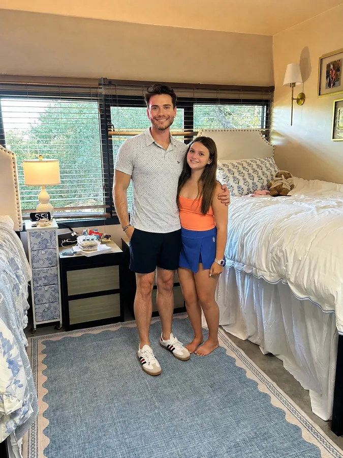 Clayton and Perry Kate in her dorm room